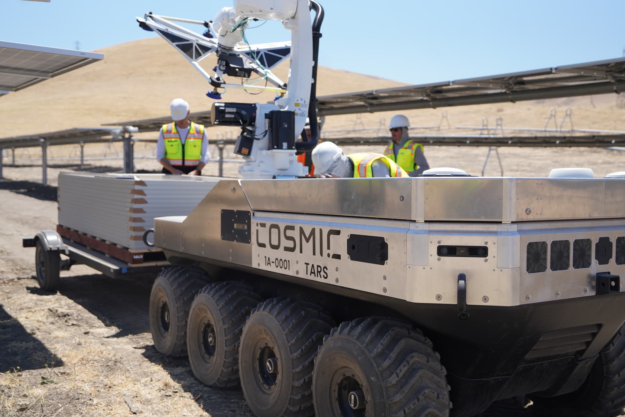 Cosmic-1 with the field crew on a California solar deployment